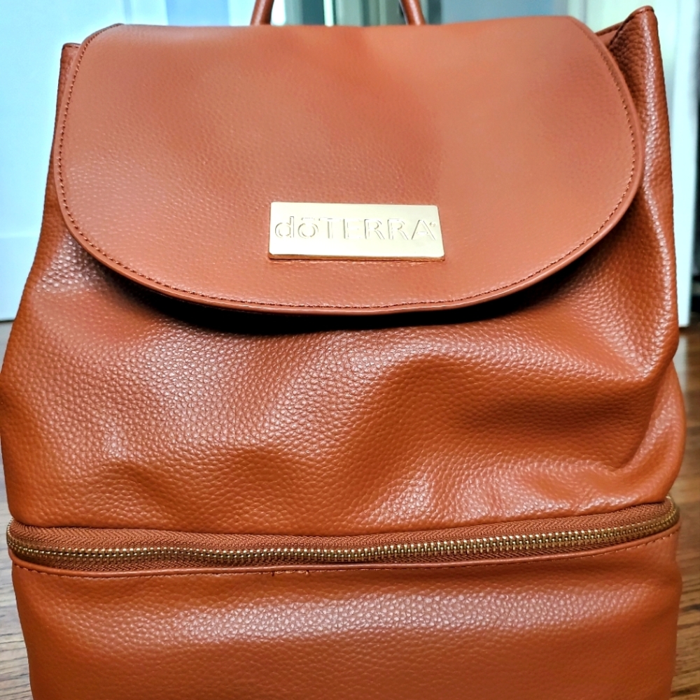 Vegan Leather, Doterra essential 15ml oil and resource brown back pack purse.